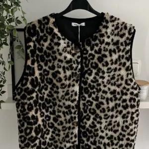 Teddyweste Leo Beige/Schwarz