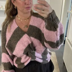 Knoten Pullover Rosa/Schoko