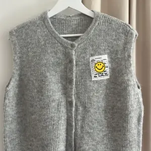 Strickweste uni Smiley light Grey