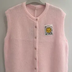 Strickweste Uni Smiley zartes Rosa