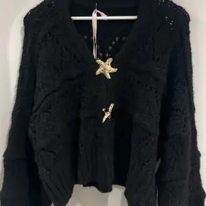 Cardigan Seestern Schwarz