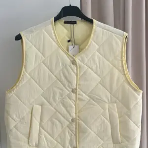 Steppweste Pastell Gelb