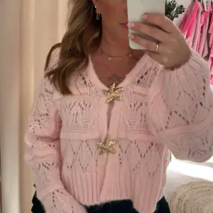 Cardigan Seestern Rosa